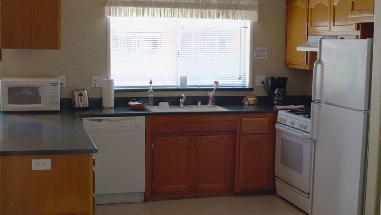 The Crane Cabin kitchen at Creekside Resort