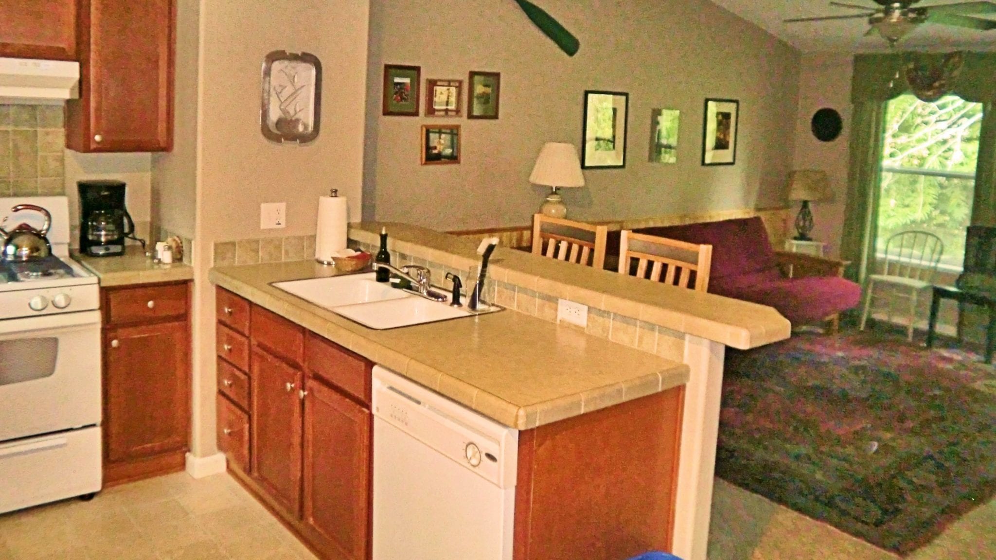 Dove kitchen and living room at Creekside